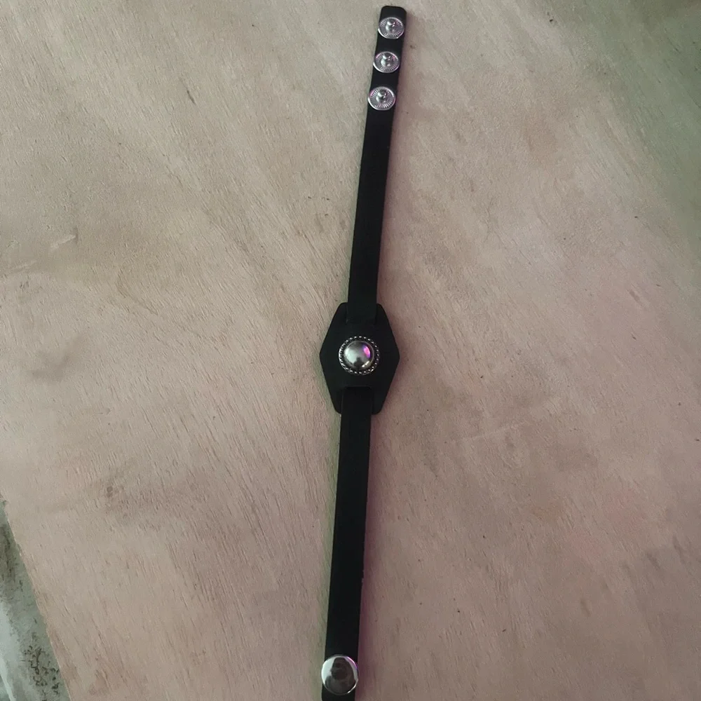 Black Leather Wearable with Silver Accent